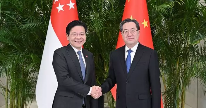 丁薛祥與新加坡副總理黃循財 共同主持4個雙邊合作機制會議