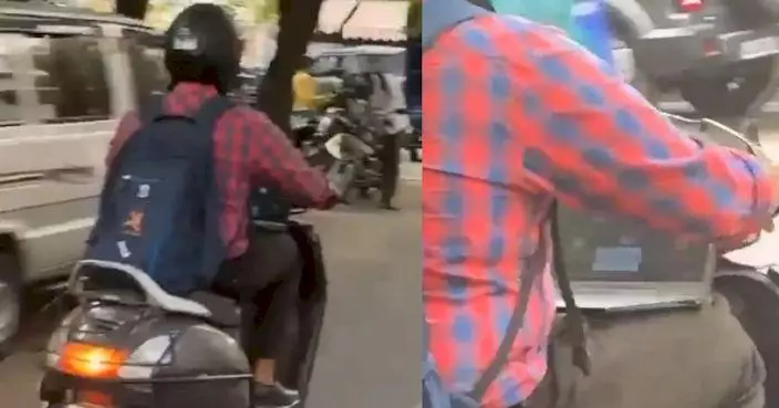 印度工作狂騎電單車邊開視像開會 網驚：死亡和客戶電話同時來