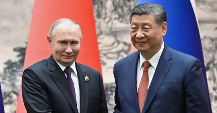習近平普京見記者    稱俄中相互貿易和投資不受任何第三國影響