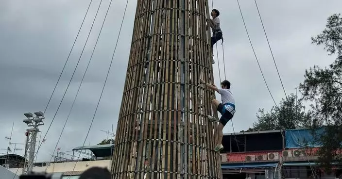 長洲攀爬嘉年華 市民即場挑戰14米高包山架