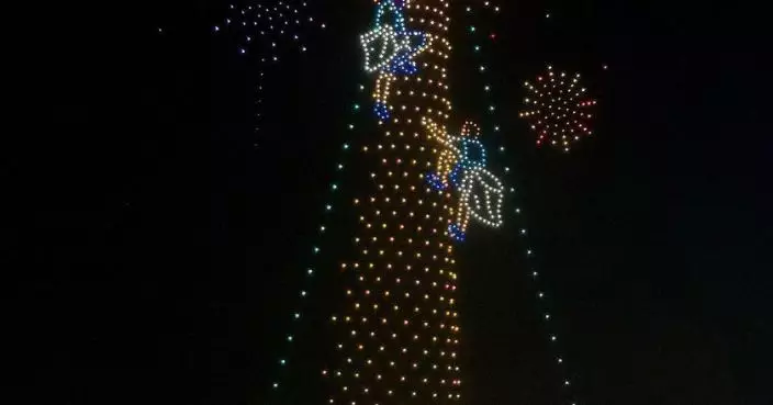 千架無人機宣傳非遺節慶 灣仔夜空呈現搶包山圖案