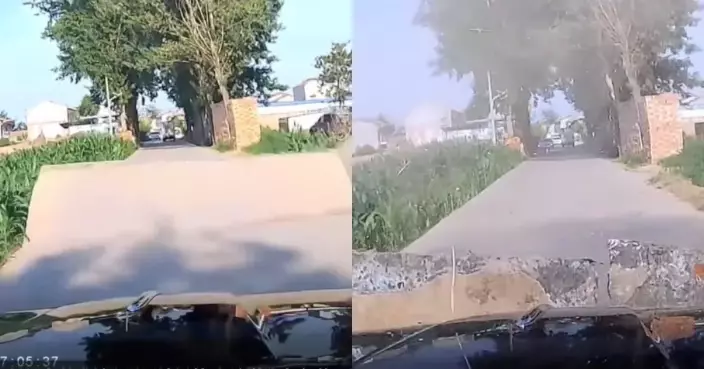 有片！河南高溫破40°C 水泥路突爆裂拱起 房車避三輪車減速驚險躲過
