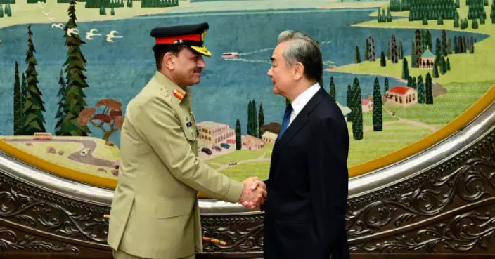 晤巴基斯坦陸軍參謀長穆尼爾 王毅支持巴方打擊一切形式恐怖主義