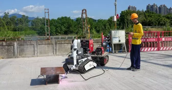 甯漢豪：發展局推動工務工程應用高效建築機械人
