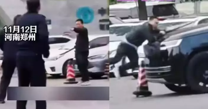 內地男街頭持刀與警員對峙 路虎司機駕車加速撞倒助警方制伏