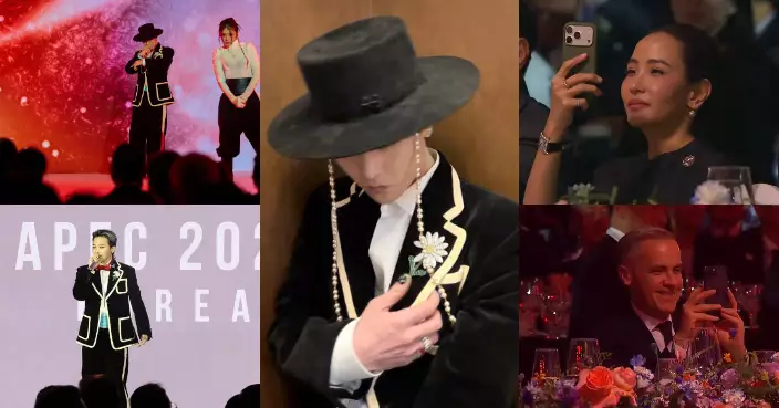 GD戴韓國傳統帽登上APEC晚宴演唱 台下各國要員舉機拍攝