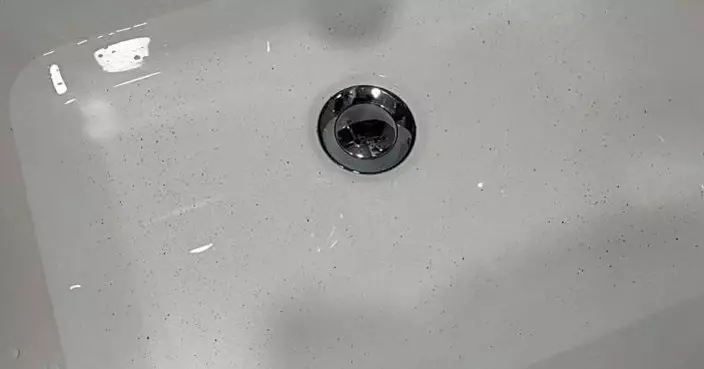 太古城食水有黑點水務署跟進 料因屋苑公共水管破損致沉積物進入