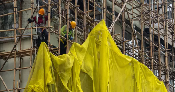 當局指115幢私人樓宇已完成棚網移除