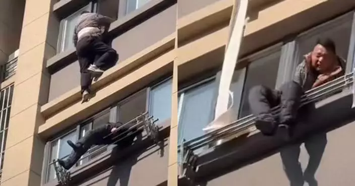 南京翁自15樓跌落卡7樓晾衣架命懸一線 保安涉險化身「蜘蛛俠」1分鐘救返