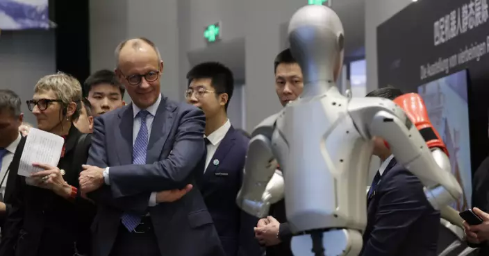 德總理默到杭州參觀機械人研發企業 指產能等問題仍有待解決