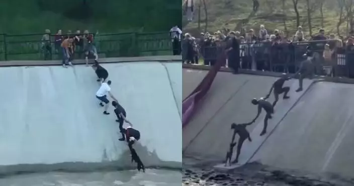 狗狗墮水庫獲熱心民眾築人鏈救援 哈薩克10年後設雕像永存「感人一幕」