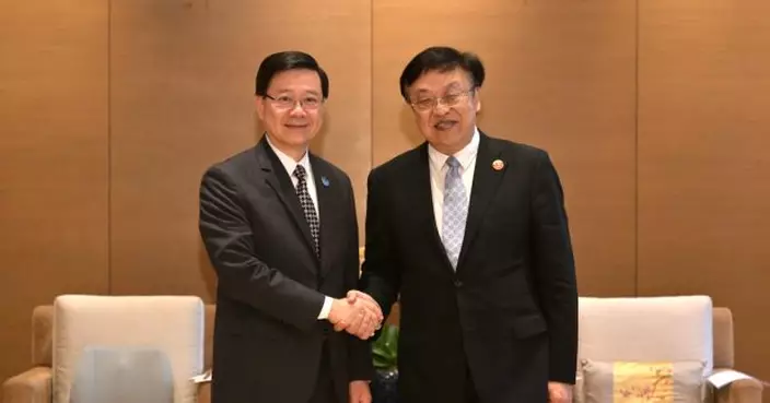 李家超與海南省委書記馮飛會面　就經貿投資及金融等方面深入交流