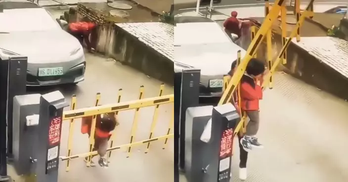 內地男童疑貪玩鑽車道閘門 因閘門突啟動遭閘桿夾起騰空 驚險畫面曝光