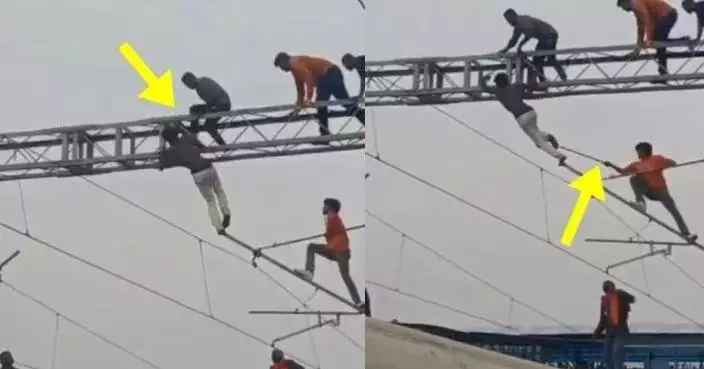 印度男火車站內攀高壓電線桿拒落地累列車受阻 救援人員高空追截揮棍制服