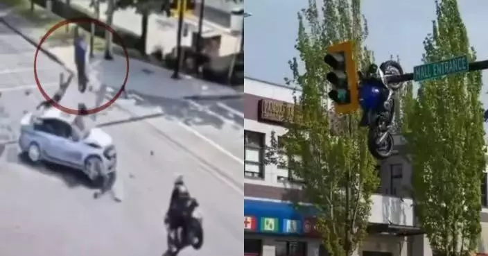 加拿大爆離奇車禍 電單車遭私家車撞飛高掛交通燈桿上 途人驚呼似電影特效
