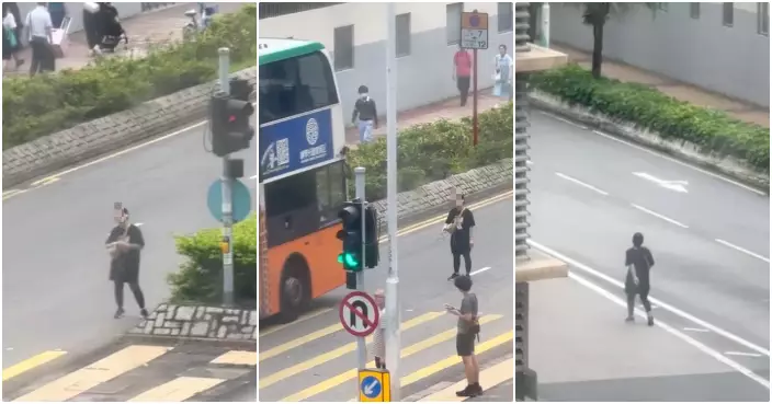 神秘黑衣女企馬路中央搖頭晃腦原地轉　網民：大地任我行