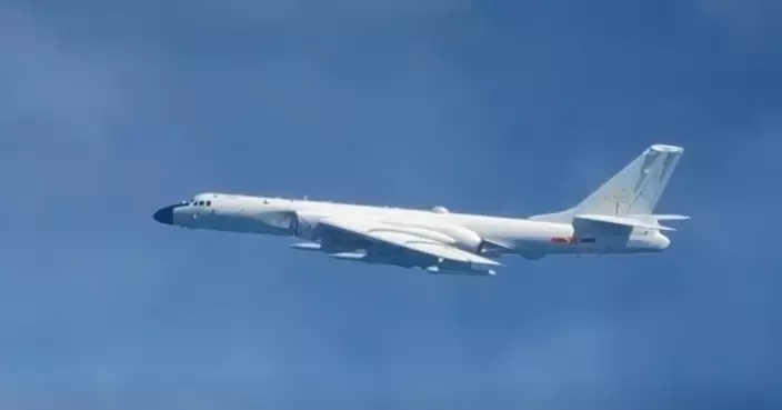 轟-6J戰略轟炸機現身黃岩島上空 翼下掛載4枚導彈