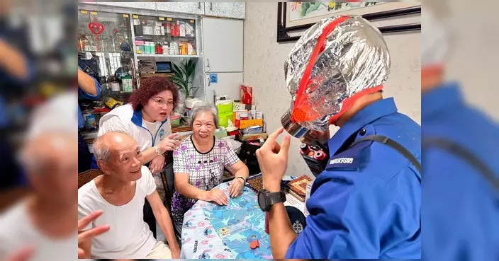 消防處聯同屯門區委員會及關愛隊 良景邨兆隆苑宣揚防火信息