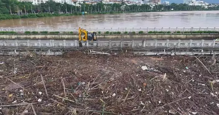 廣西水災復原加快 清理河道重開學校