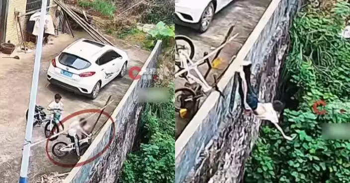 踩單車高速落斜煞車不及 湖南男童撞牆凌空翻落4米護坡奇蹟僅擦傷