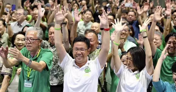 日本自民黨支持的候選人古謝玄太當選沖繩縣知事