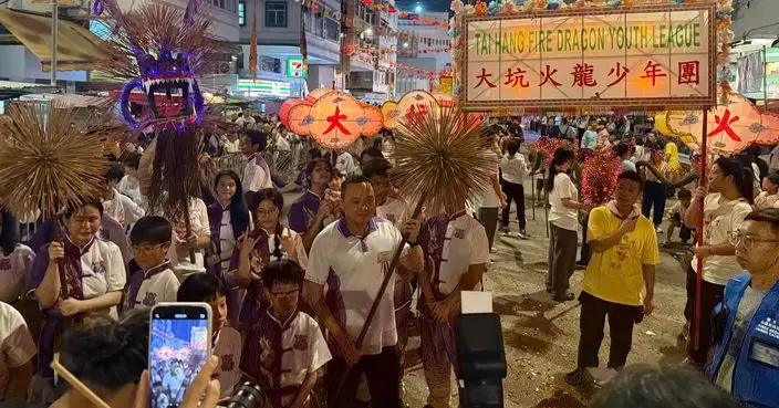 國安處製20米「國安小火龍」現身大坑舞火龍  少年警訊舞龍薪火相傳國安責任