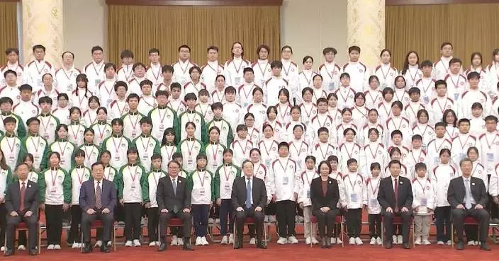 丁薛祥接見港澳青少年升旗隊代表訪京團