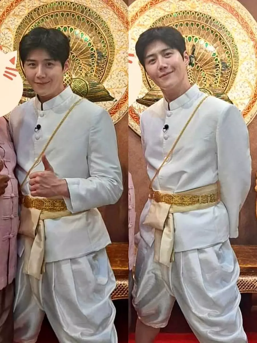 金宣虎穿上泰國特色服裝與粉絲合照（網上圖片）